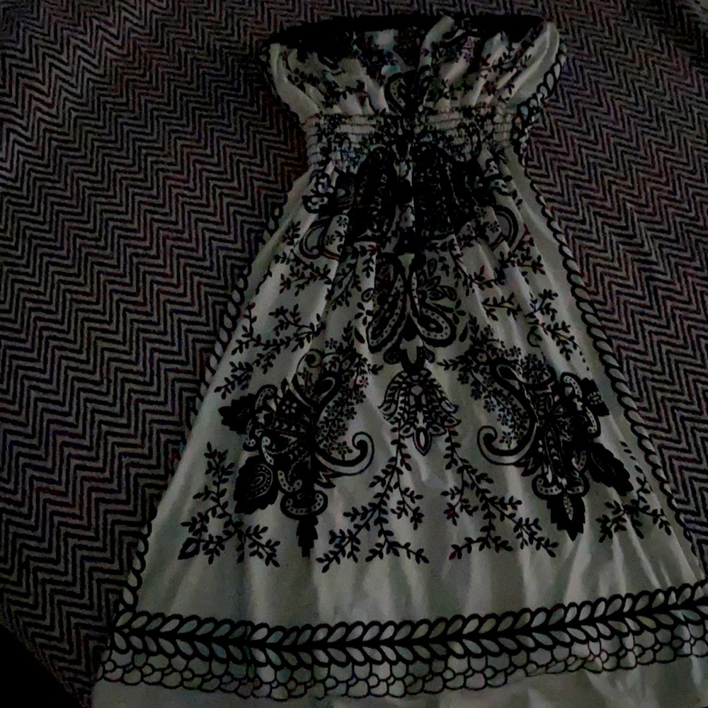 Strapless, colors are white and black, nice design